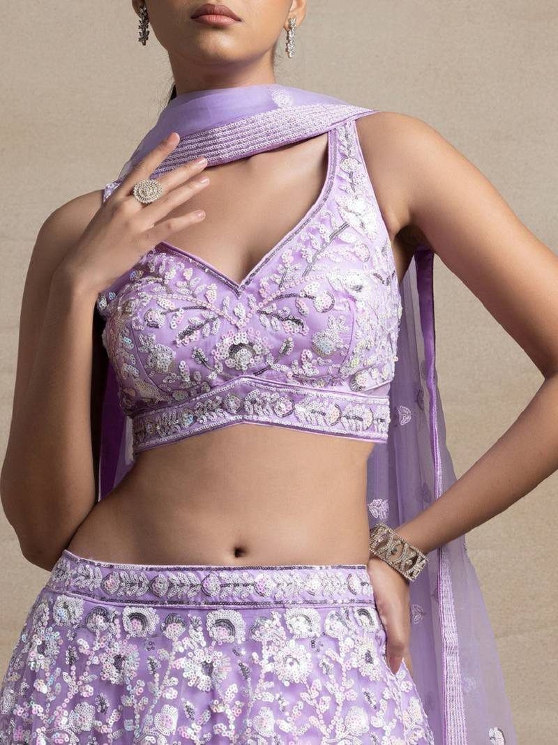 Astonishing Lavender Sequins Embroidered Soft Net Bridal Lehenga
