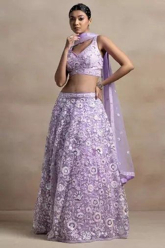 Astonishing Lavender Sequins Embroidered Soft Net Bridal Lehenga