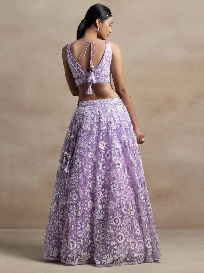 Astonishing Lavender Sequins Embroidered Soft Net Bridal Lehenga