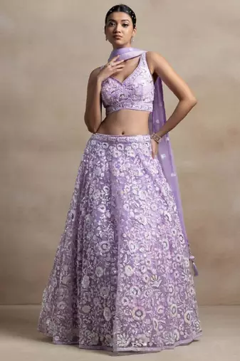 Astonishing Lavender Sequins Embroidered Soft Net Bridal Lehenga