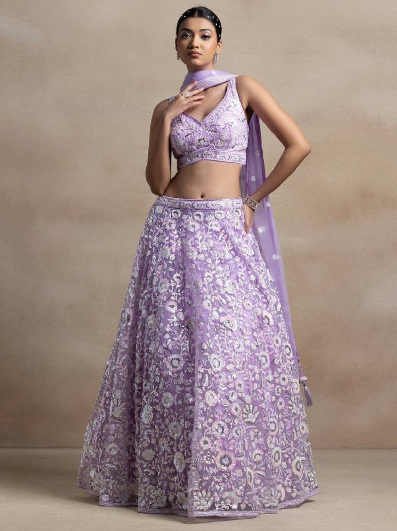 Astonishing Lavender Sequins Embroidered Soft Net Bridal Lehenga
