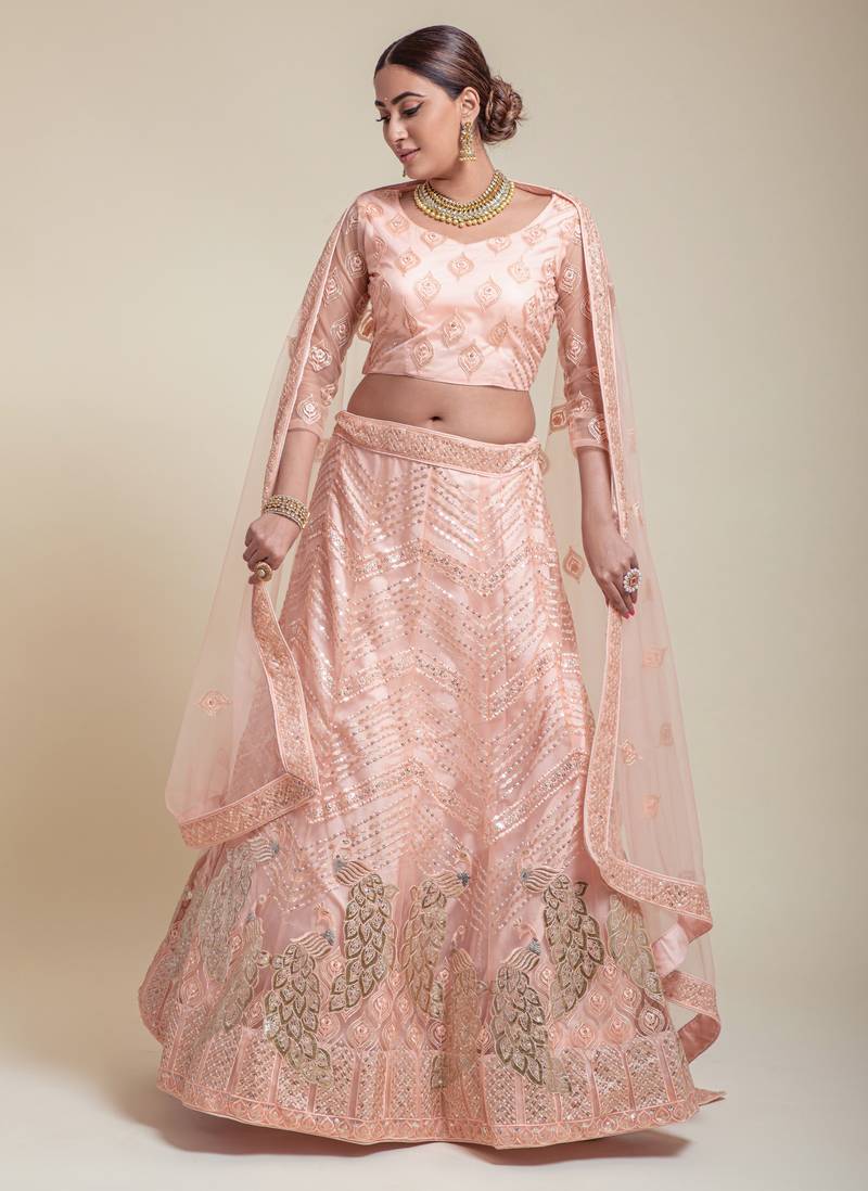 Delightful Peach Sequins Zari And Thread Embroidered Net Wedding & Party Lehenga