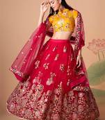 Amazing Rani Pink Net Bridesmaid Lehenga Choli with Yellow Blouse and Dupatta