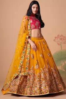 yellow net lehenga set choli with dupatta with gold blouse and dupatta