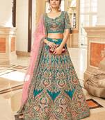 Wonderful Teal Blue Embroidered Velvet Bridal Lehenga Choli  