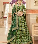 Wonderful Green Embroidered Art Silk Wedding Wear Lehenga Choli