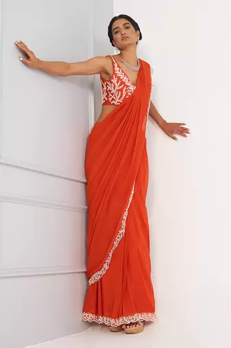 Zoe Orange Pre Drape Saree With Embroidered