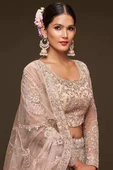 Glamorous Beige Embroidered Net Wedding Wear Lehenga Choli