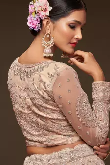 Glamorous Beige Embroidered Net Wedding Wear Lehenga Choli