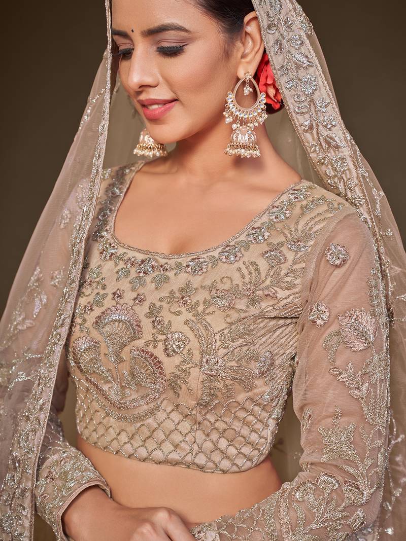 Glamorous Lilac Embroidered Net Wedding Wear Lehenga Choli