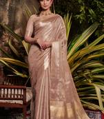 Peach woven silk blend saree with blouse