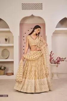 Beige sequins net semi stitched lehenga