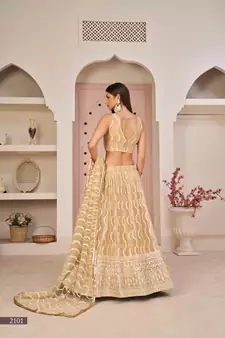 Beige sequins net semi stitched lehenga