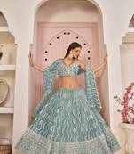 Blue sequins net semi stitched lehenga