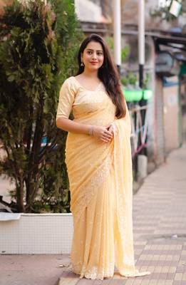 Yellow printed chiffon saree with blouse 1