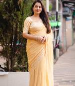 Yellow printed chiffon saree with blouse