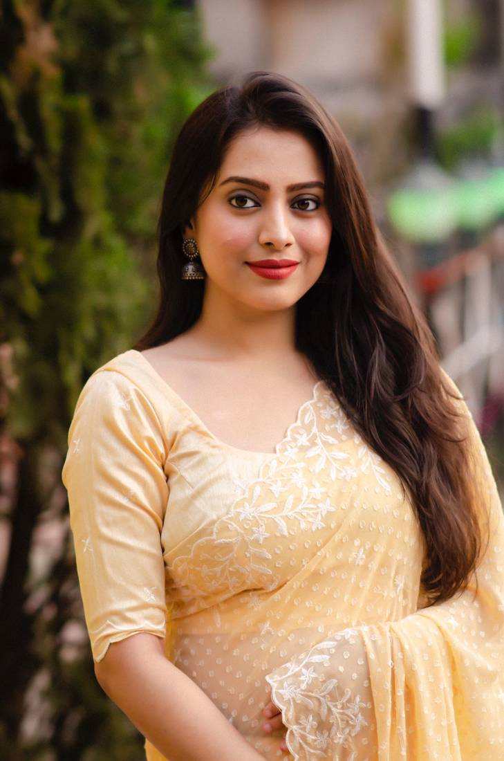 Yellow printed chiffon saree with blouse