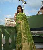Green woven organza saree with blouse