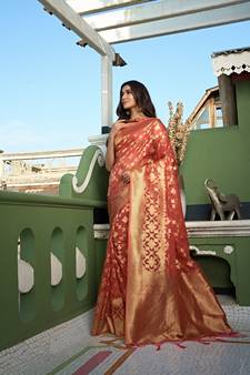 Peach woven organza saree with blouse