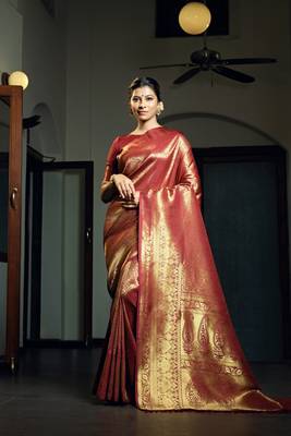 Maroon woven kanchipuram silk blend saree with blouse 1