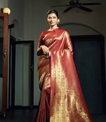 Maroon woven kanchipuram silk blend saree with blouse