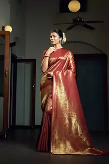 Maroon woven kanchipuram silk blend saree with blouse