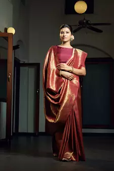 Maroon woven kanchipuram silk blend saree with blouse