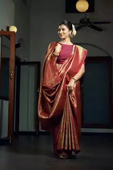 Maroon woven kanchipuram silk blend saree with blouse