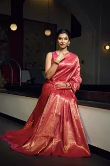 Pink woven kanchipuram silk blend saree with blouse
