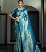 Blue woven kanchipuram silk blend saree with blouse