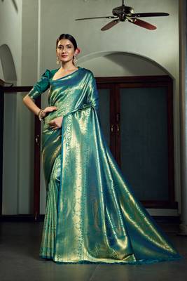 Teal woven kanchipuram silk blend saree with blouse 1