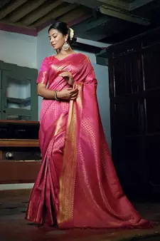 Pink woven kanchipuram silk saree with blouse