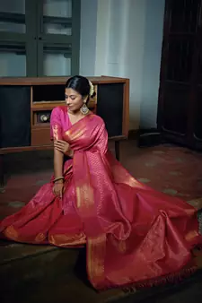Pink woven kanchipuram silk saree with blouse