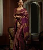 Wine woven kanchipuram silk saree with blouse