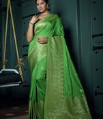 Green woven banarasi saree with blouse