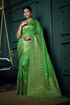 Green woven banarasi saree with blouse