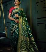 Green woven banarasi saree with blouse