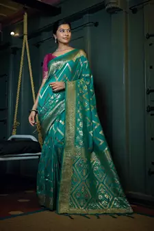 Teal woven banarasi saree with blouse
