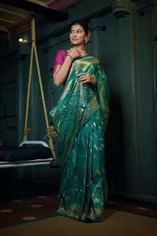 Teal woven banarasi saree with blouse