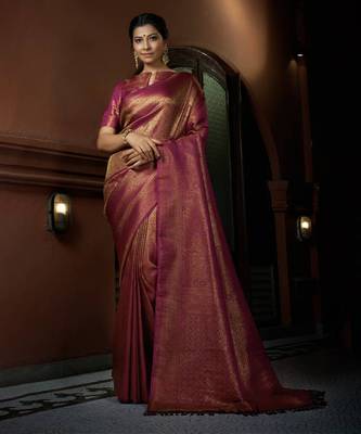 Pink woven kanchipuram silk blend saree with blouse 1