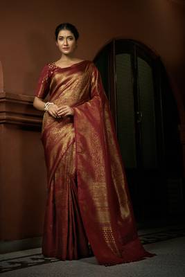 Maroon woven kanchipuram silk blend saree with blouse 1
