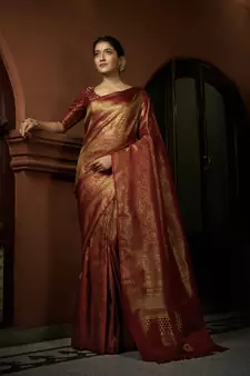 Maroon woven kanchipuram silk blend saree with blouse