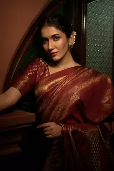 Maroon woven kanchipuram silk blend saree with blouse