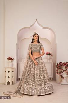 Brown embroidered
 net semi stitched lehenga