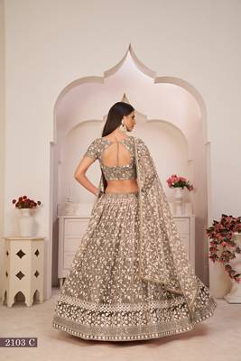 Brown embroidered
 net semi stitched lehenga 4