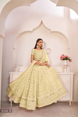 Light-yellow embroidered
 net semi stitched lehenga 2