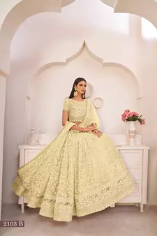 Light-yellow embroidered
 net semi stitched lehenga