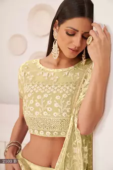 Light-yellow embroidered
 net semi stitched lehenga
