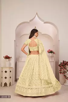 Light-yellow embroidered
 net semi stitched lehenga