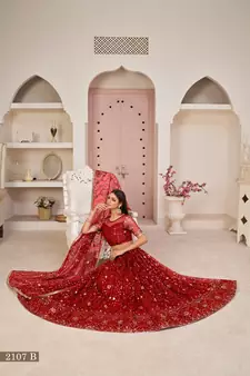 Red embroidered net semi stitched lehenga